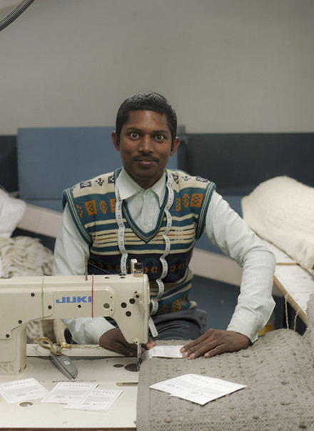 man sewing 