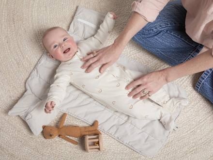 Travel Changing Pad Shown In A Room