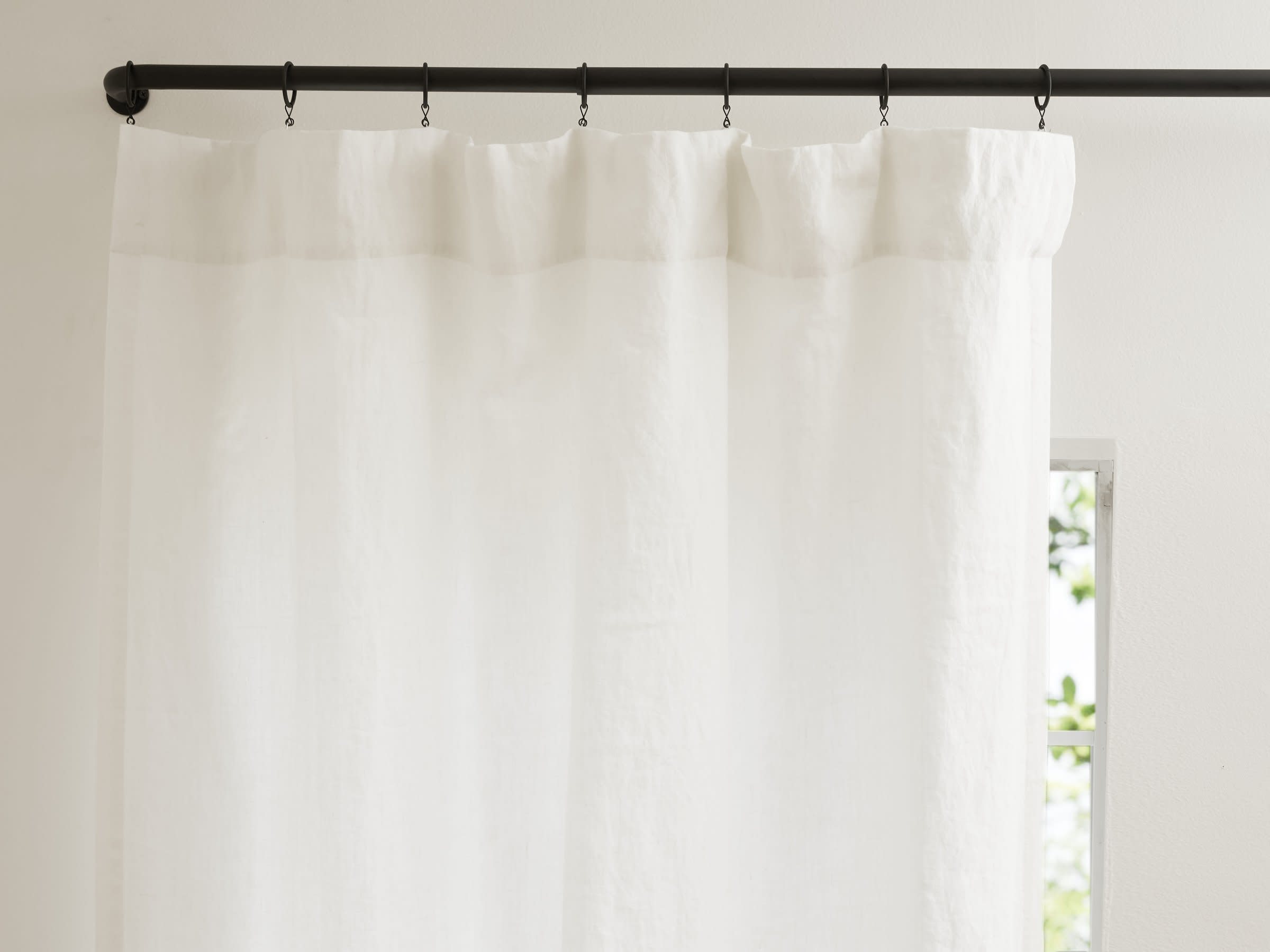 White Washed Linen Curtain Shown In A Room
