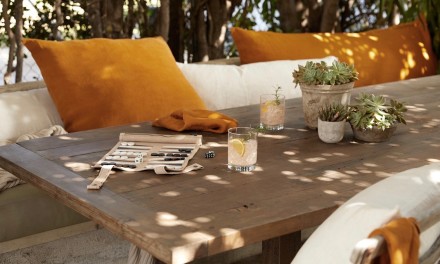 Grapefruit cocktail on an outdoor table.