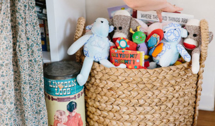 Storage basket with toys and books. 
