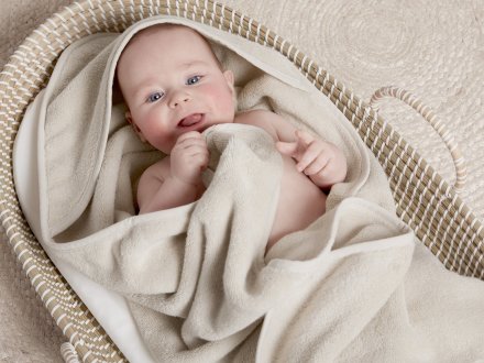 Hooded Baby Towel Shown In A Room