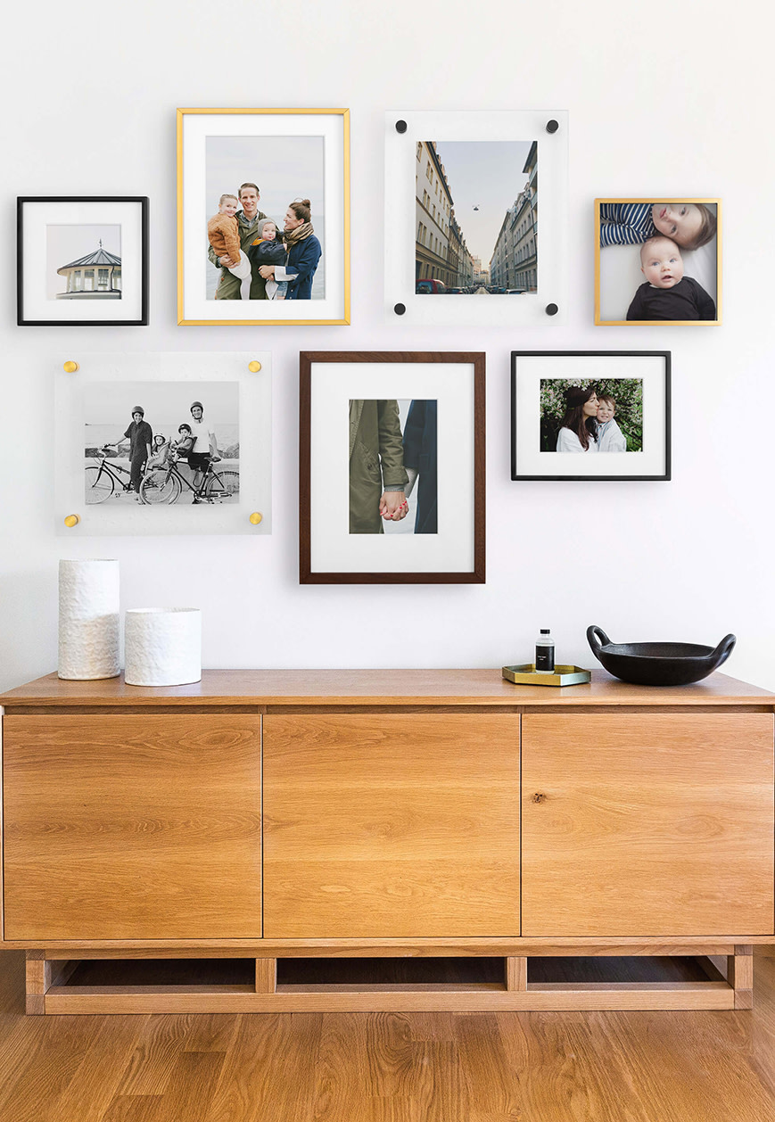 Gallery wall of framed pictures 