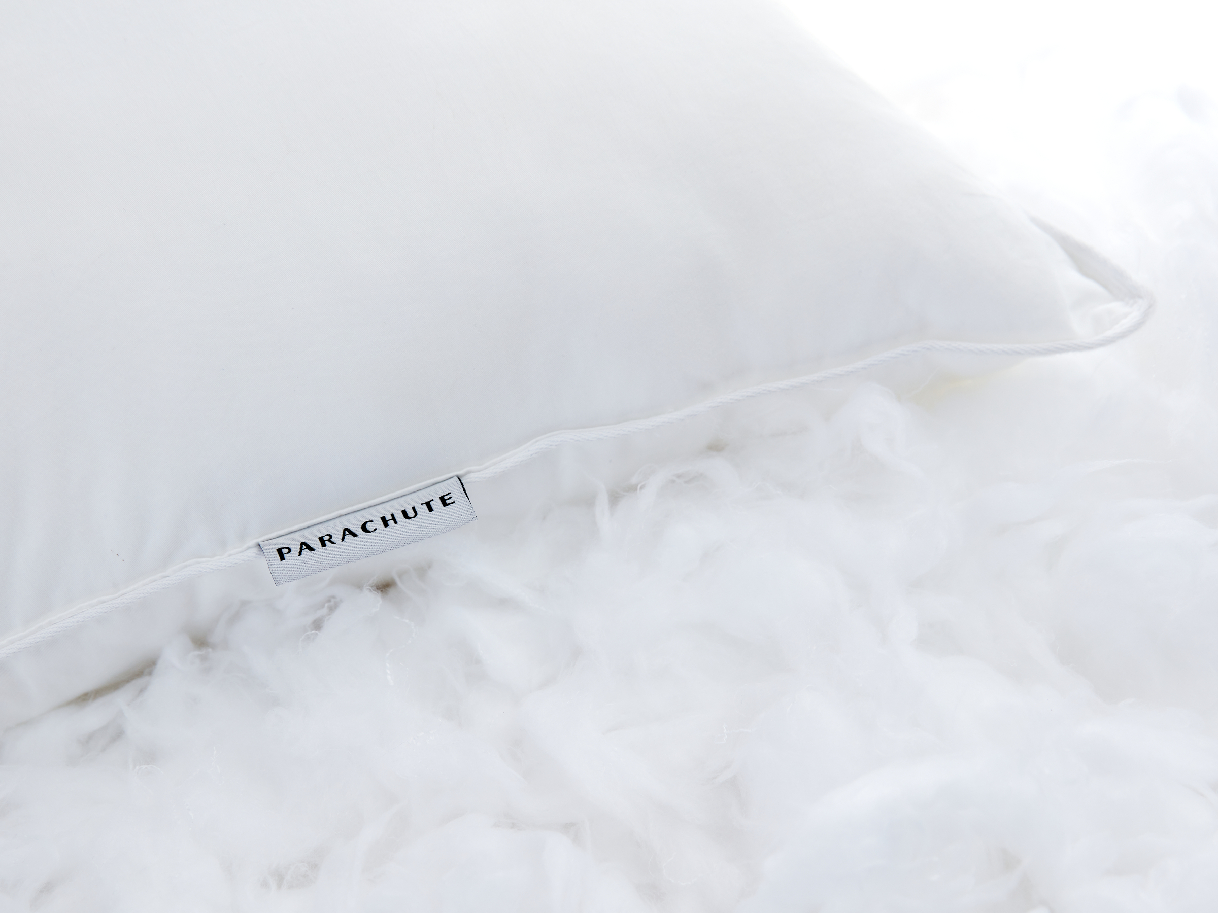 Parachute side outlet sleeper pillow