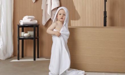 baby in a hooded towel 
