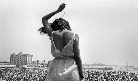 Black and white image of a woman in Venice. 