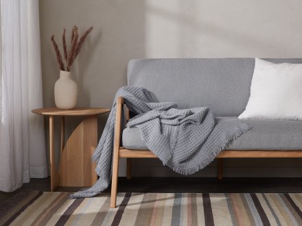 Wool Cashmere Waffle Throw Shown In A Room