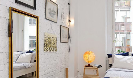 bedroom with string lights on the wall