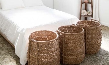 three baskets at the end of the bed
