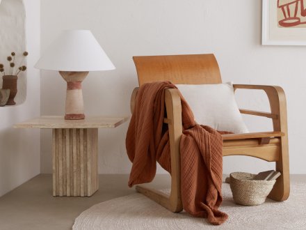 Round Jute Rug Shown In A Room