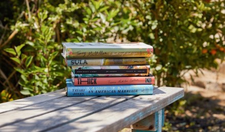 Books stacked on a bench