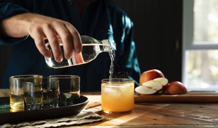 Man pouring a cocktail.