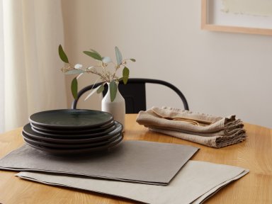 Light Grey Tec Paper Placemats Shown In A Room