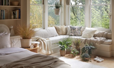 living room full of plants 