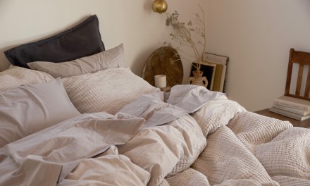 cozy bedding layered in multiple fabrics