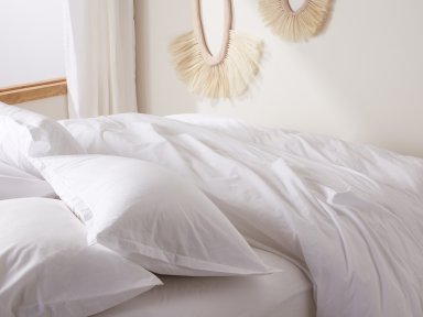 White Brushed Cotton Duvet Cover Set Shown In A Room