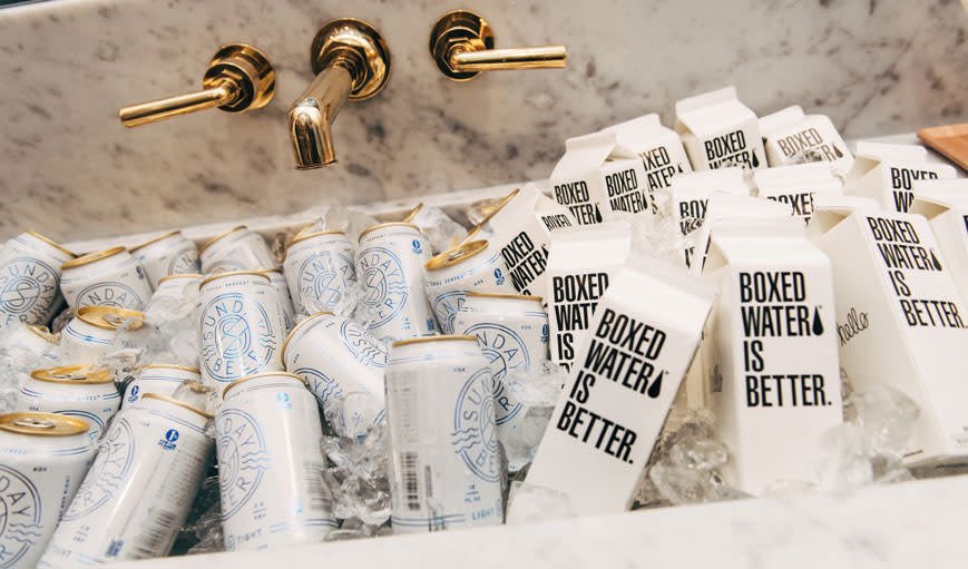 Cans of beer and boxed water 