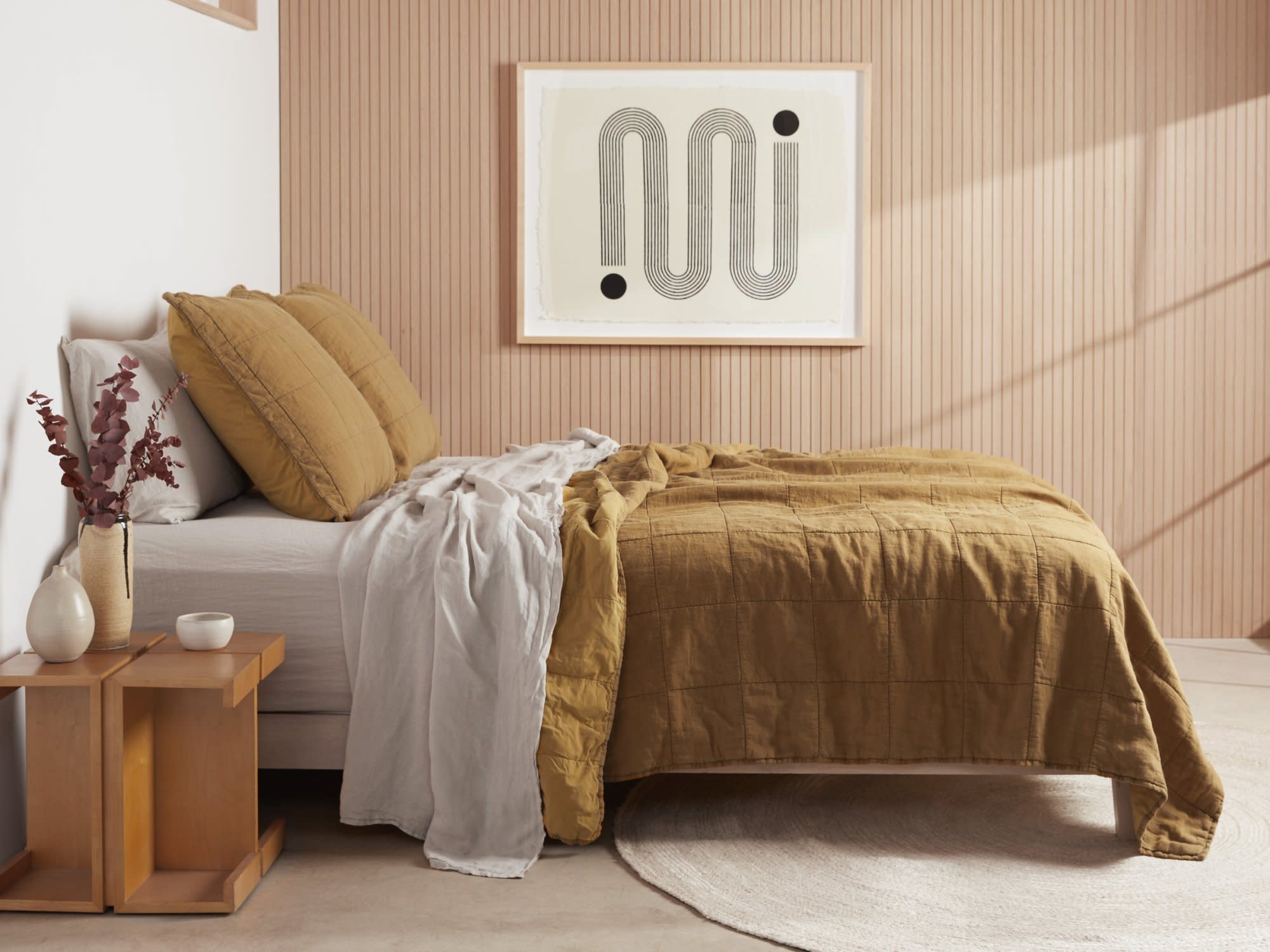 Ochre Linen Box Quilt Shown In A Room