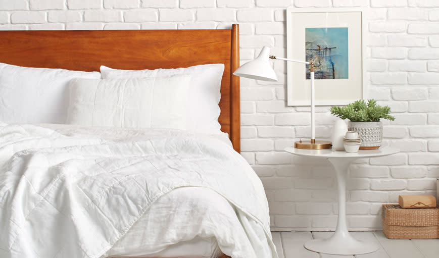 White quilt on a bed