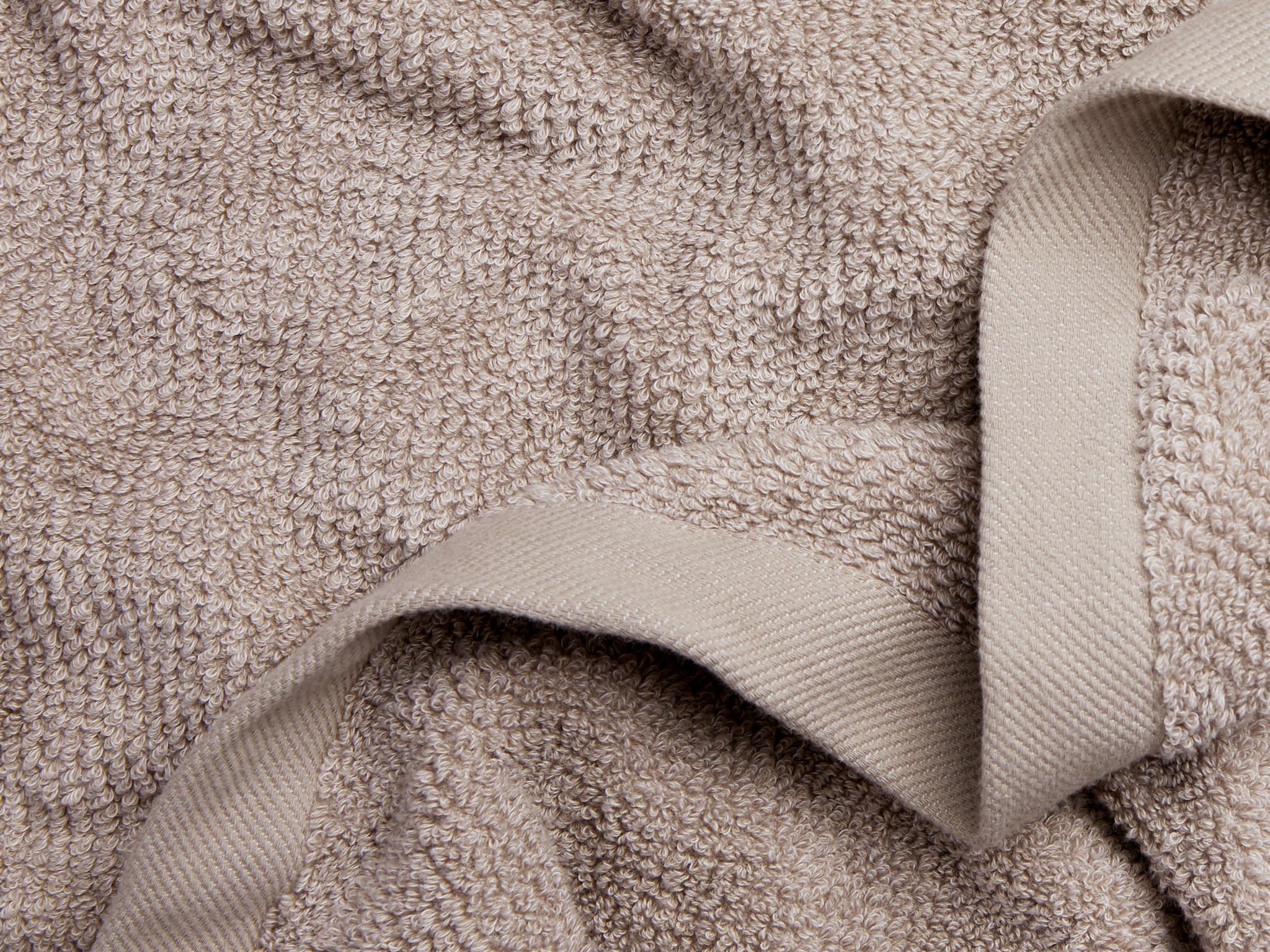 Close Up Of Sandstone Heathered Towels