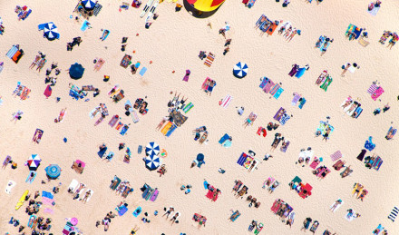 Image of people laying out on the beach