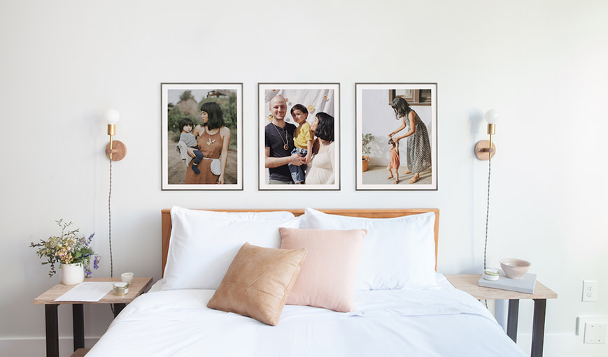 Three framed pictures of a family 