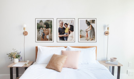 Three framed pictures of a family 