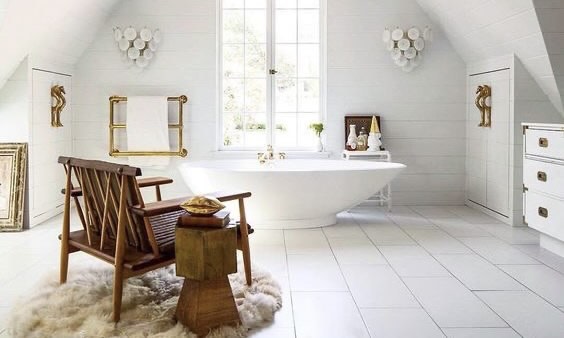 bathroom with a chair