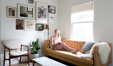 Woman sitting on a couch. 