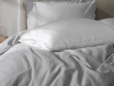 White Silk Pillowcase Shown In A Room