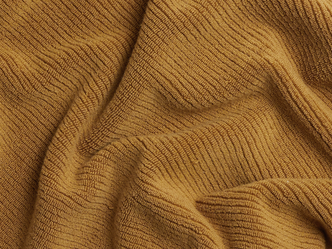 https://images.ctfassets.net/ltric1hkjv72/4yTuLi80AP5gVNfNsMbbAS/a6cc8ca1591980acabc5949ad2290c55/soft-rib-towels_ochre_detail_0386__1_.jpg