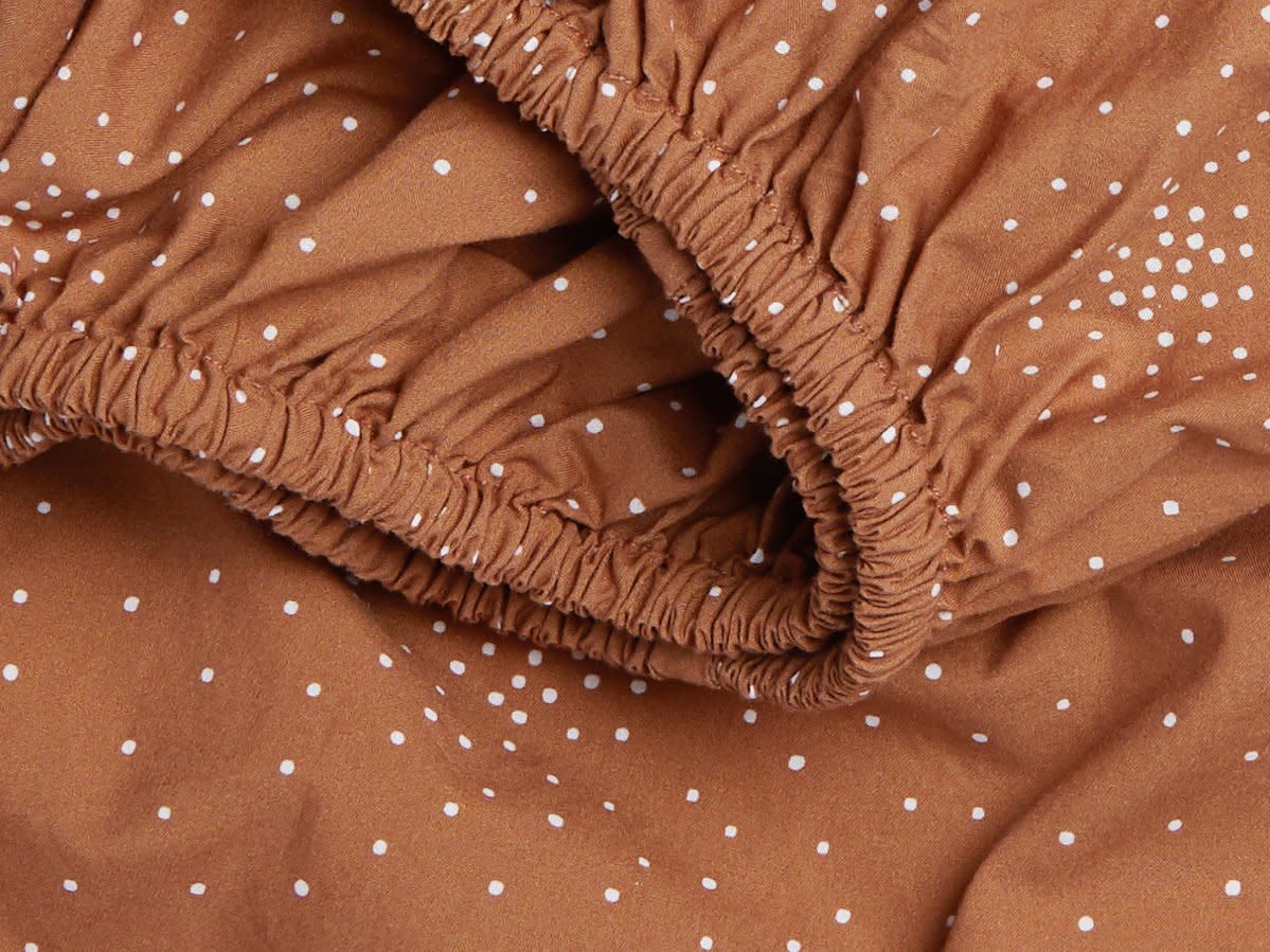 Close Up Of Terra Confetti Crib Sheet