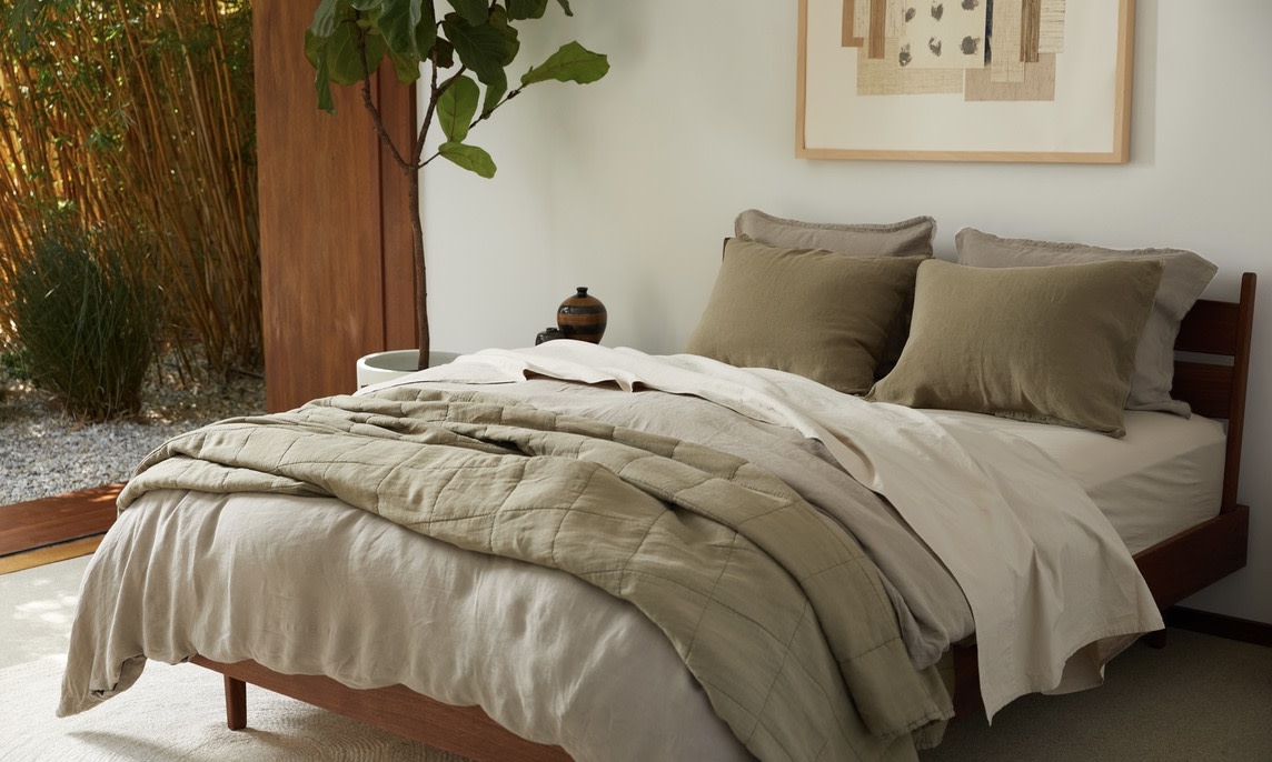 Olive green accents on bed
