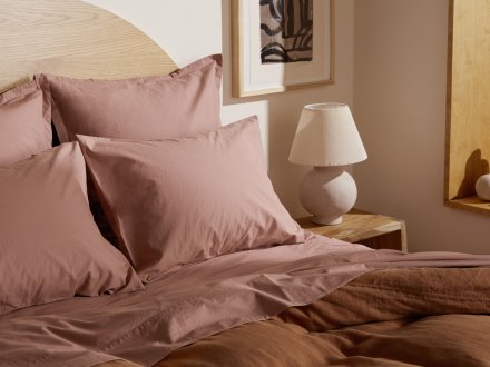 Percale Pillowcase Set Shown In A Room