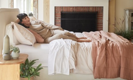 woman laying on her bed