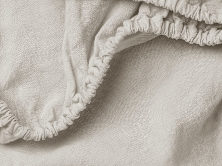 Close Up Of Linen Crib Sheet