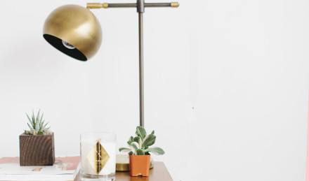 Metallic lamp on a table. 