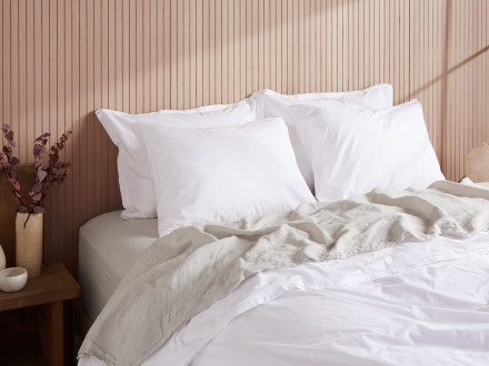 Linen Top Sheet Shown In A Room