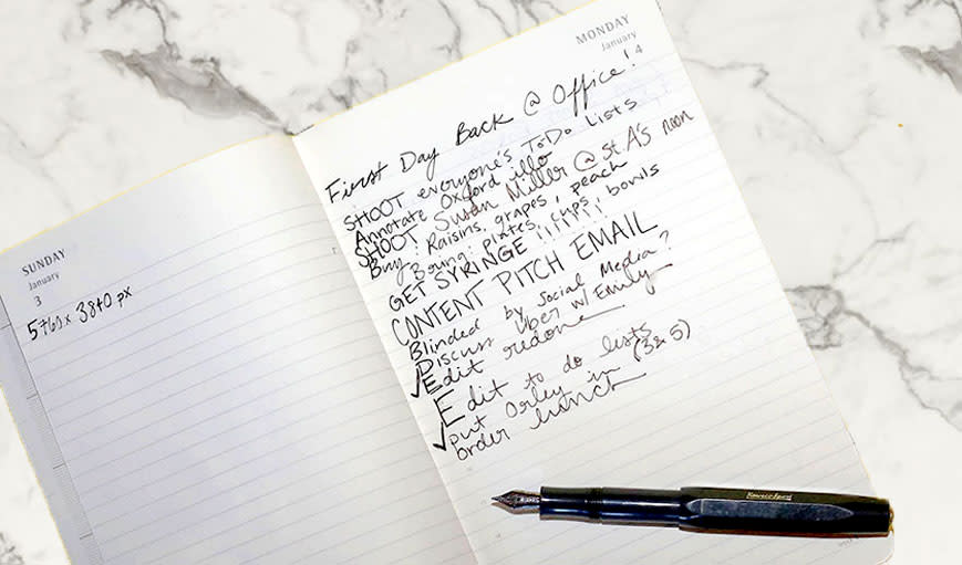 Image of a to-do list in a journal. 