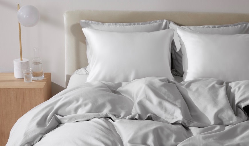 Silk pillowcases on bed.
