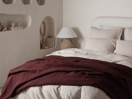 Vintage Linen Bed Cover Shown In A Room