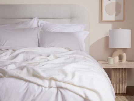 Vintage Linen Bed Cover Shown In A Room