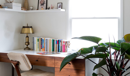 A desk with books on it. 