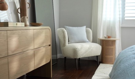 Chair, dresser and mirror in Ariel's room.