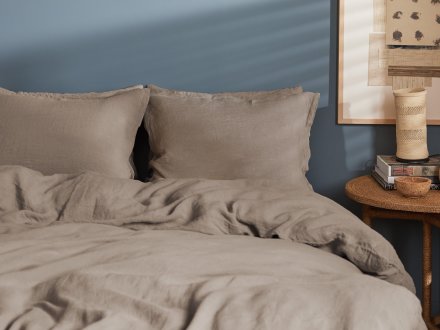 Linen Sham Set Shown In A Room