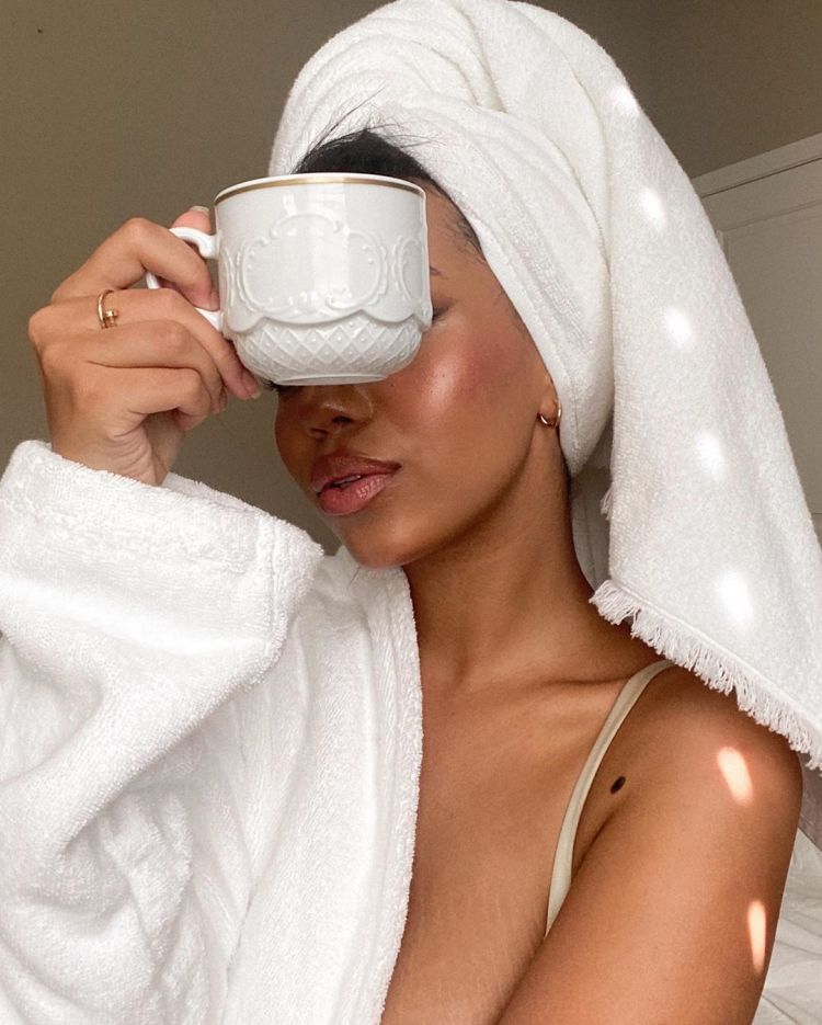 instagram user @daphneblunt in a white classic bath robe and white spa towels