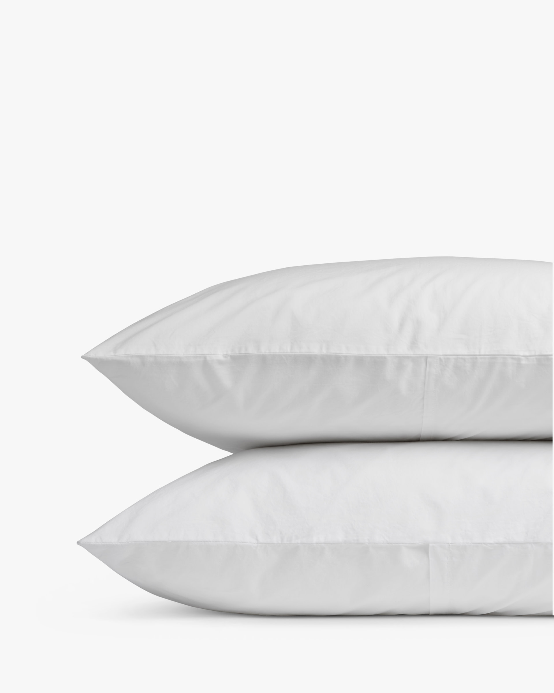 https://images.ctfassets.net/ltric1hkjv72/6cSHrisE8YwhmM52X1ba0L/c97ef7f73e03a6c074ee5d000c14de06/organic-cotton-pillowcase-set_white_cpg_8012.jpg?fm=jpg&fl=progressive