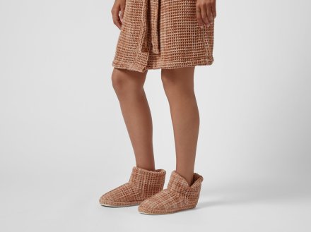 Waffle Bootie Shown In A Room