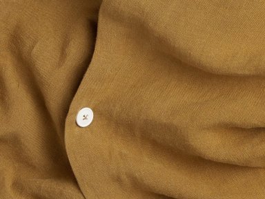 Close Up Of Ochre Linen Duvet Cover