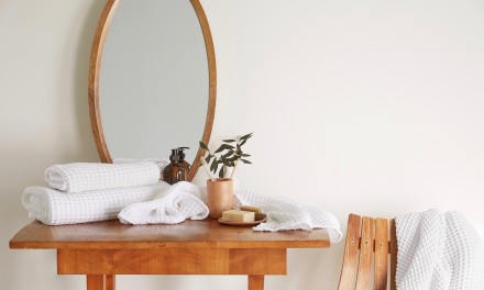 Towels on a vanity in bathroom. 